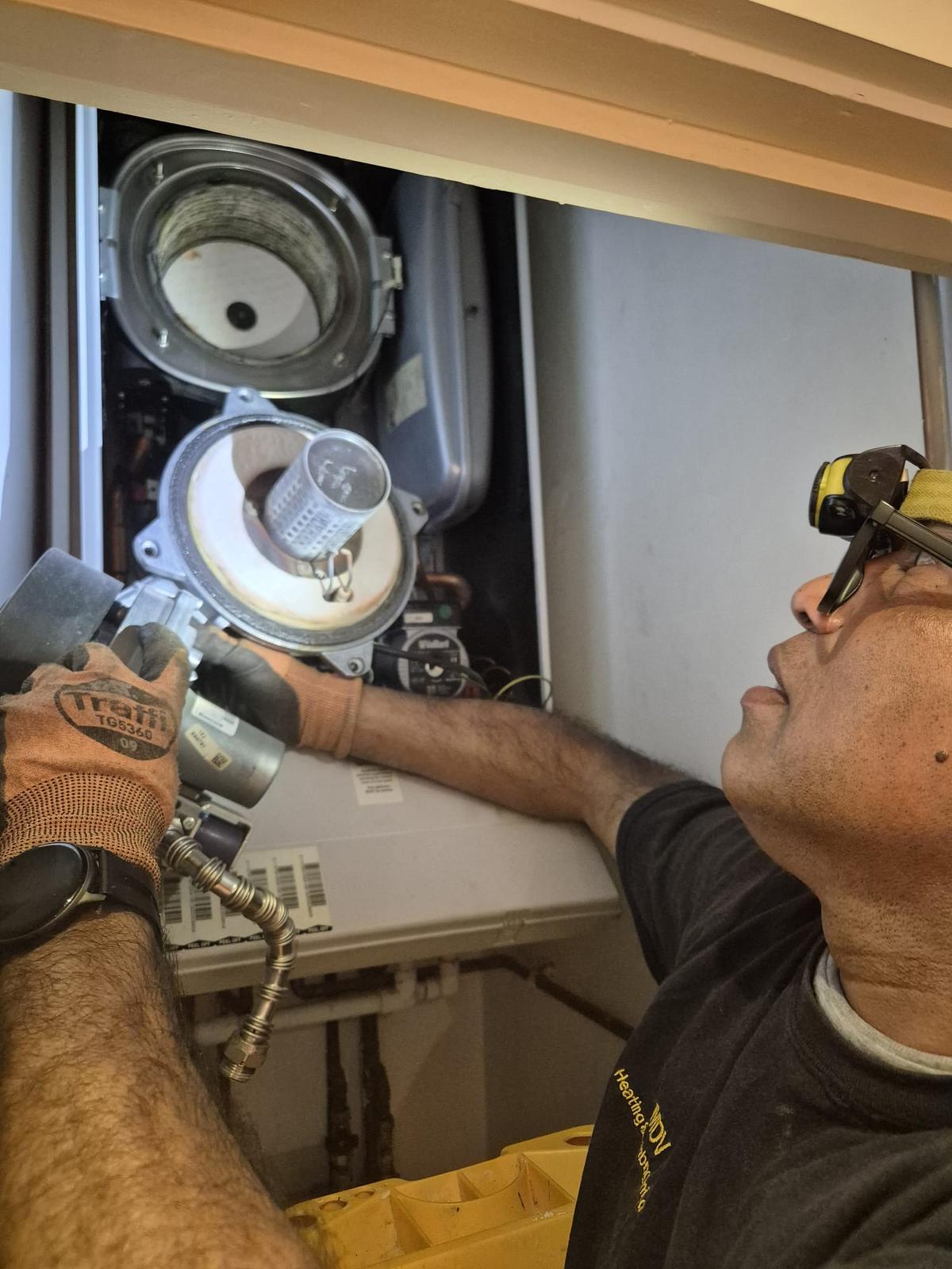 MDV engineer servicing a boiler